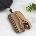 Collier en bois sculpté, culture africaine