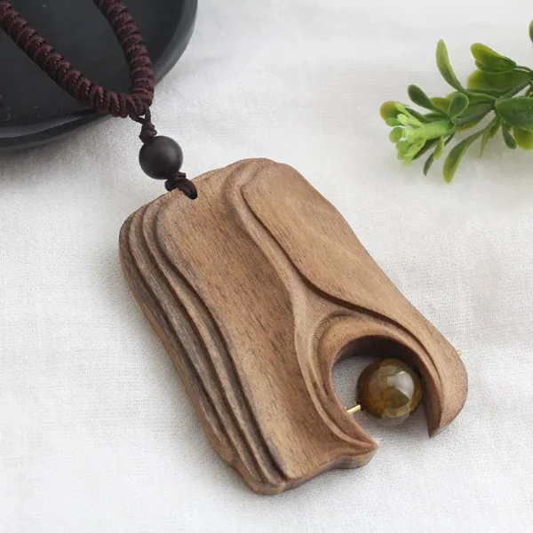 Collier en bois sculpté, culture africaine