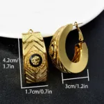 Accessoire mode boucle d’oreille africaine en or