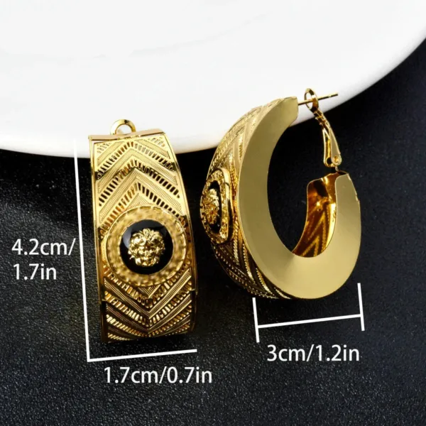 Accessoire mode boucle d’oreille africaine en or