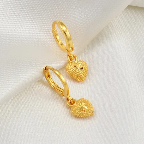 Boucle d'oreille cœur en or, style africain