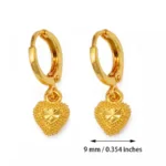 Boucle d'oreille design africain, élégance dorée