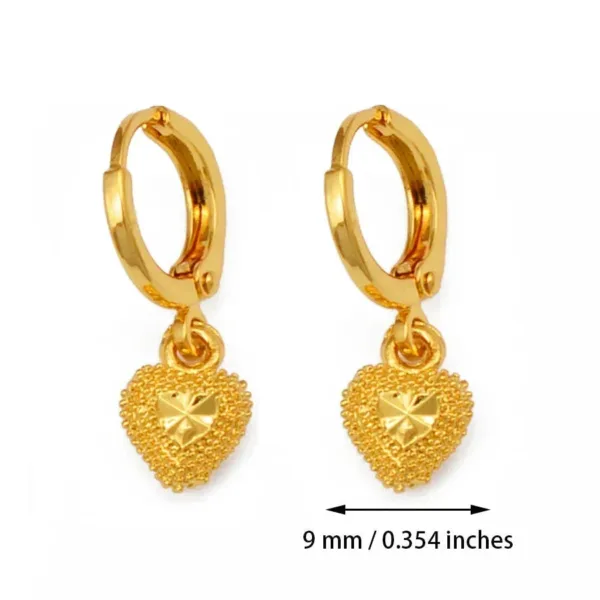 Boucle d'oreille design africain, élégance dorée