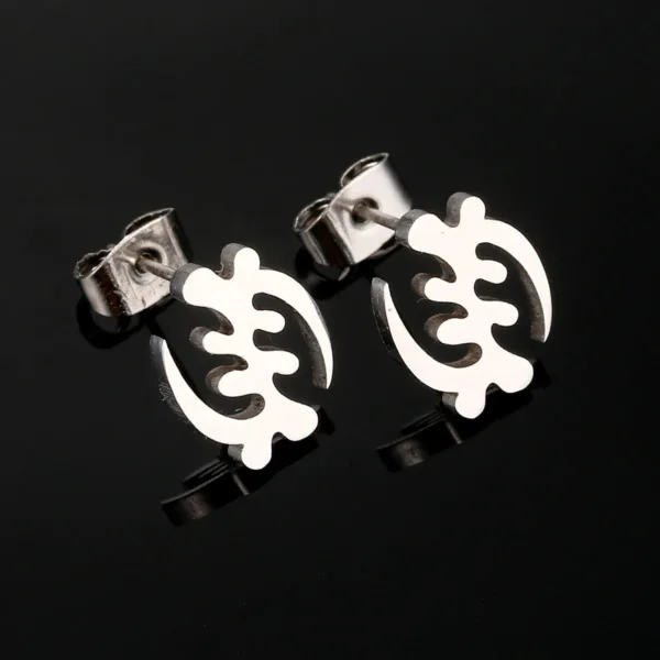 Boucles d'oreilles africaines illustrant la culture Gye Nyame