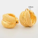 Boucle d'oreille plaqué or style africain