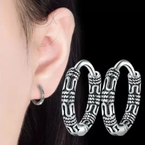 Création artisanale : boucle d'oreille argentée