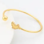 Bracelet africain or avec coquillage Cauris