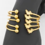 Accessoire africain : bracelet en or Cauris