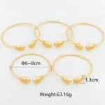 Bracelet or Cauris, mélange de tradition et modernité