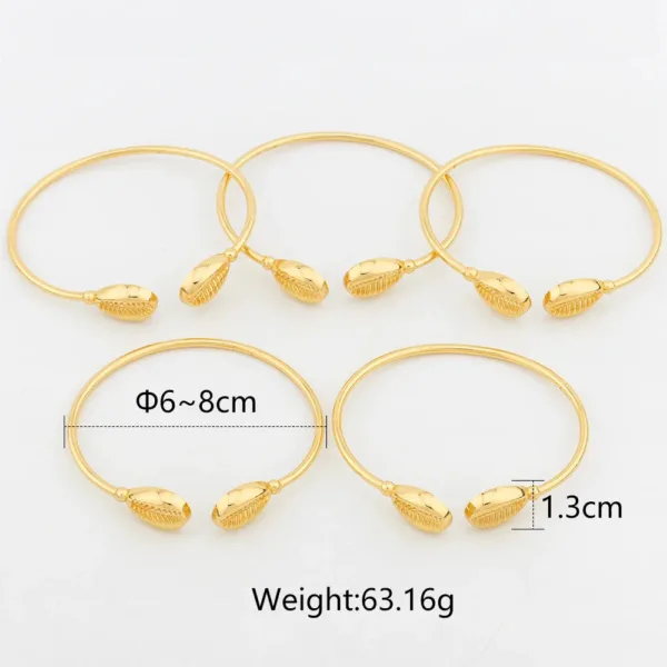 Bracelet or Cauris, mélange de tradition et modernité
