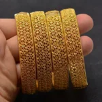 Élégance du bracelet or africain pour toutes les occasions