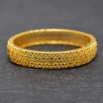Bracelet or pour femme, allure chic et ethnique
