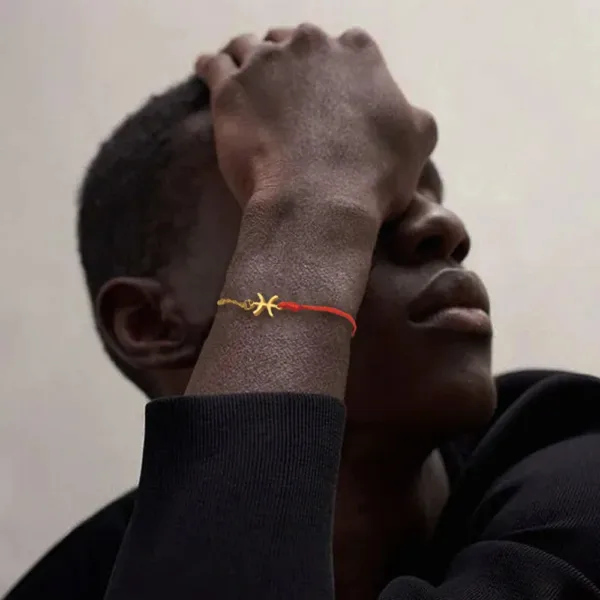 Bracelet artisanat africain avec symbole historique