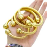 Accessoire en or 24 Carats d'inspiration africaine