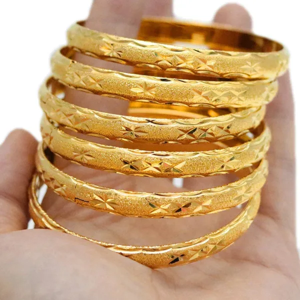 Bracelet or 24 Carats avec motifs africains
