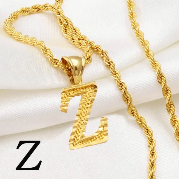 Collier avec motif africain et initiale