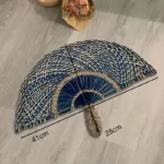Accessoire pratique : éventail africain