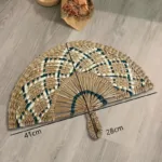 Éventail artistique inspiré de l'Afrique
