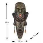 Élément décoratif : masque africain en bois