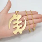 Pendentif Adinkra Gye Nyame en métal africain