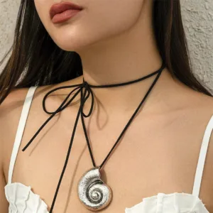 Pendentif en forme de coquillage, style Afrique en or