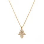 Pendentif or Main Fatma Afrique, symbole de protection