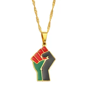 Pendentif Poing Africain Levé en métal