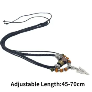 Pendentif artisanal, motif flèche, style ethnique africain