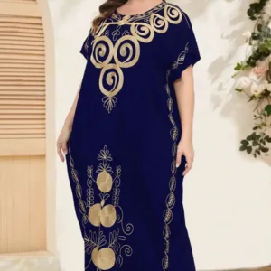 Robe en coton noir avec motifs dorés