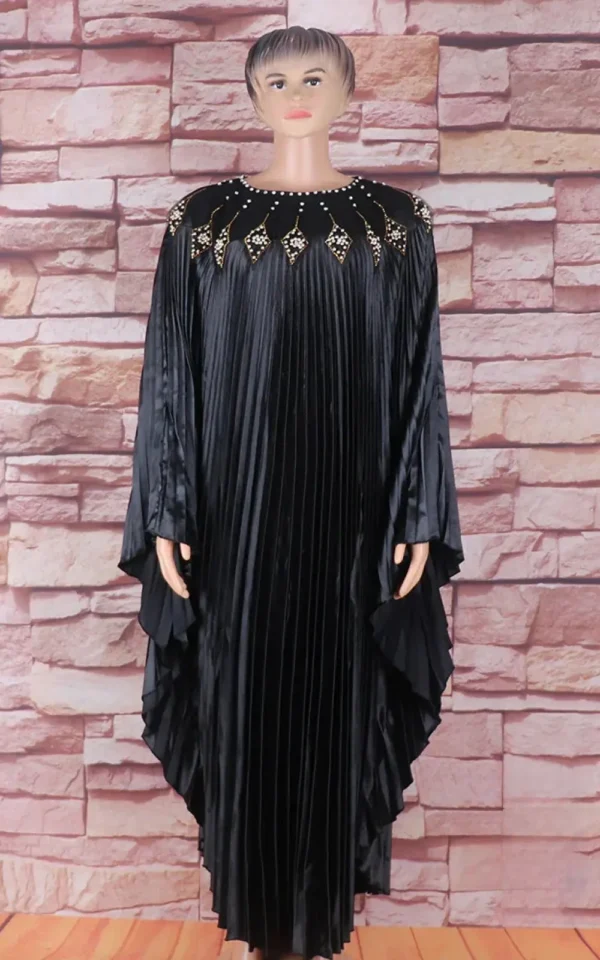 Robe en tissu africain avec décorations de perles