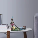 Art africain contemporain, statue de femme allongée