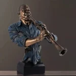 Sculpture africaine illustrant un musicien passionné